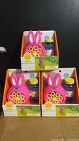 Front view of three boxed Bunny Bubble Makers