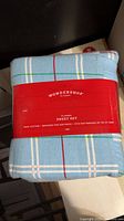 Front of packaged Wondershop king flannel sheet set