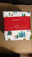 Front view of sealed WonderShop flannel sheet set package