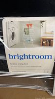 Front of sealed package showing Brightroom branding and product photo