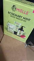 Front of sealed Mielle Rosemary Mint Root Rescue Kit box