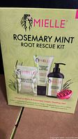 Front of sealed Mielle Rosemary Mint Root Rescue Kit box showing product images and title