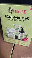Front of sealed Mielle Rosemary Mint Root Rescue Kit box showing included products