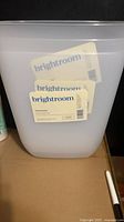 Front view showing Brightroom labels on waste basket