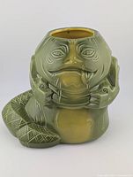 front view of green Jabba the Hutt ceramic Geeki Tiki mug