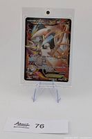 Front view of White Kyurem EX card in plastic case