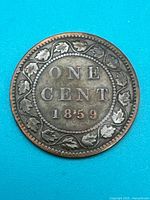 Reverse showing ONE CENT 1859 within maple leaf wreath