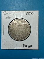 Full view of reverse showing denomination, wreath and date