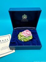 Trinket box inside presentation box with booklet