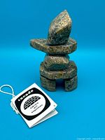 front view of sculpture with tag visible