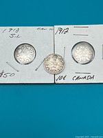 All three coins in holders, 1907 loose, 1912 and 1913 in 2x2s