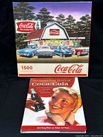 Front view of puzzle box and book