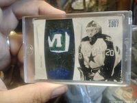 Front of card showing embroidered patch and Belfour image