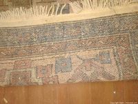 Close-up of border, fringe and weave back side