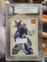 Front of Ed Belfour Parkhurst Retro Series jersey patch card in sealed holder