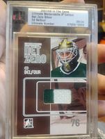 Front of slabbed 2007-08 ITG Ultimate Memorabilia Net Zero Silver Ed Belfour card showing jersey patch and serial 09/24