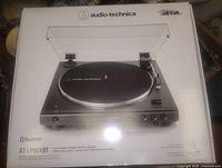 Front of sealed Audio-Technica AT-LP60XBT box showing product image and branding
