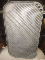 Ribbed grilling surface showing full rectangular plate