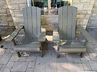Front view of both matching composite Muskoka chairs
