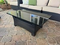 Full view of coffee table on patio pavers