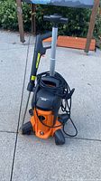 Front view of Birctenway JPW602 pressure washer with spray wand and power cord
