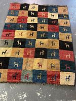 Full view of multicolour checkerboard Gabbeh rug