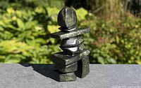 Front view of signed Inuit soapstone inukshuk sculpture