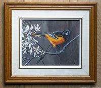 Front view of framed painting showing artwork, frame, mat and signature