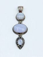 Front view showing three agate cabochons and silver design