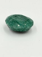 Oblique view of full emerald showing faceting and color