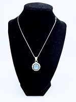 Full view of necklace on display bust