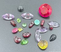 Group shot of all gemstones on dark background