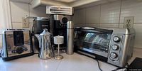 Group shot of five small appliances on countertop