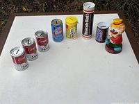 All eight piggy banks arranged on table