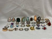 Group shot of all rings laid out in three rows