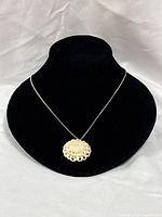 Full view of necklace on display bust