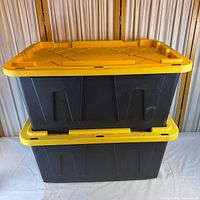 Front view of both stacked totes showing lids and body