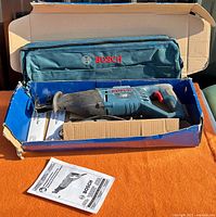 Saw, carrying bag, manuals inside original box