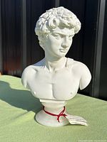 Front view of marble David bust on alabaster base