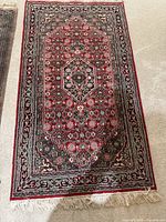 Full view of Kurdish wool rug showing overall design and condition