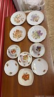 Top view of all ten china pieces arranged on table