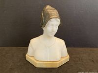 Front view of alabaster bust with bronze headpiece