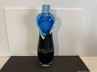 Full view of vase front showing color layers and overall form