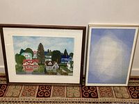 Both framed prints side by side