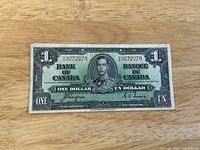 Front view showing portrait of King George VI, denomination, serial number 3272279