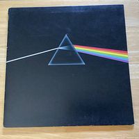 Front jacket showing prism artwork and fray on spine top left