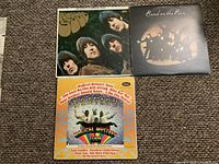 Front covers of Rubber Soul, Band on the Run, Magical Mystery Tour