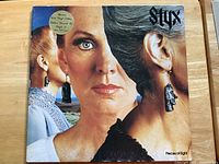 Front of Styx Pieces of Eight album jacket with gold vinyl edition sticker