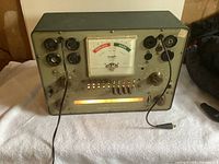 Front view of Knight vacuum tube tester showing meter, sockets, controls, power cord