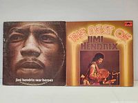 Front covers of both LPs displayed side by side